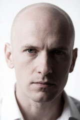 Fototapeta premium bald man close up portrait white background