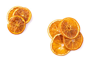 Dried  orange slices on white background.