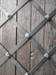 Texture of old castle gates. Castle gates. Close-up. Entrance to the castle. Texture old