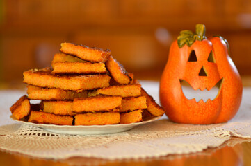 slices of homemade pumpkin pie at the plate