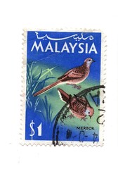 Fototapeta premium A vintage postage stamp from Malaysia isolated on a white background.