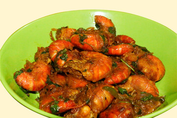 Spicy Prawn Curry or Chingri Bhuna in a Green Bowl on a Vibrant Yellow Background - A Close-up of Delicious South Asian Cuisine.