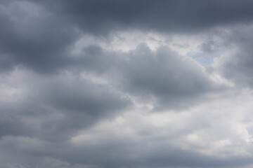 overcast sky filled with dark and light gray clouds, conveying a sense of moodiness