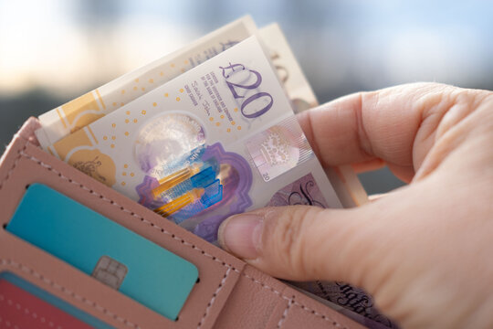 wallet with British GBP banknotes, cash in female hands, counting uk pounds bills, paper money, Money Management Accuracy, payments to fund, financial freedom, save up for vacation