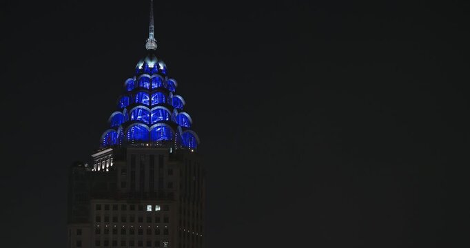 Shanghai, China Night view Union Building in Shanghai showcases classic architectural details at night. Shanghai, China. Night view ICBC - Industrial and Commercial Bank building, colonial
