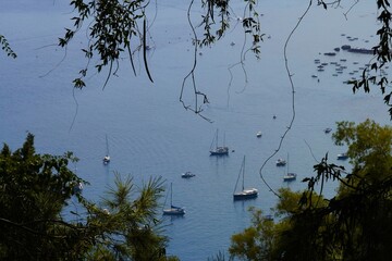 Taormina, Sicily - the charming Corso Umberto, medieval alleys, stunning Mediterranean scenery,...