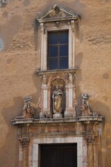 Taormina, Sicily - the charming Corso Umberto, medieval alleys, stunning Mediterranean scenery,...