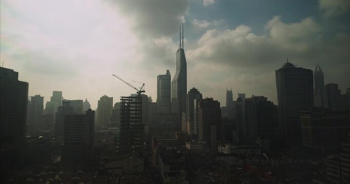 Shanghai, China. Time-lapse Urban Skyline with construction site works. crane working development. City Business Center. Smog Over City. Shanghai Waitan Residential District. Modern Shanghai