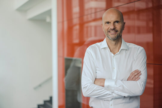 Portrait of a successful businessman, with arms crossed