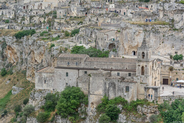 Matera – Chiesa di San Pietro Caveoso and Stone-Built Sassi District on Rocky Hillside,...