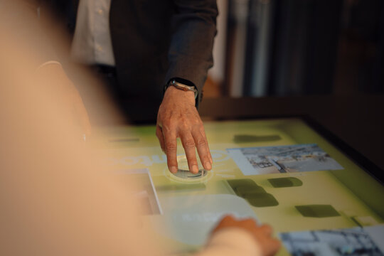 Business collaboration using touchscreen technology in modern office