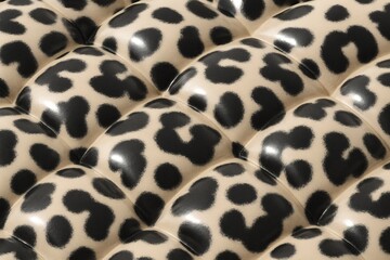Fototapeta premium Black leopard print glossy quilted texture background for design and wallpaper
