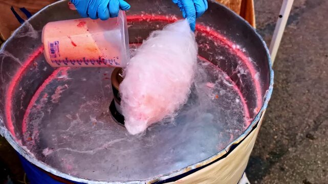 Cotton candy machine fairy floss carnival dessert sweet treat how is made