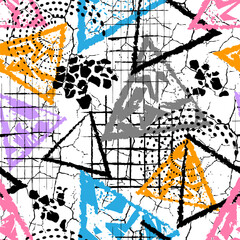 Urban seamless graffiti pattern with cracked textures, colorful triangles, and black grunge effects on white. Ideal for streetwear, skate, and sportswear prints.