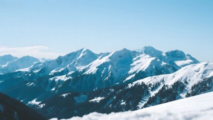 Obraz premium Snow-Capped Mountain Peaks Under a Clear Blue Sky