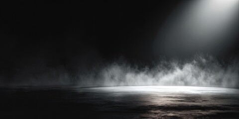 Smoky, dark studio scene with spotlight