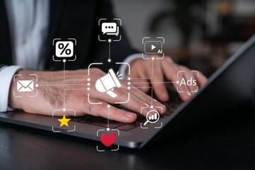 Digital marketing strategy. Announce promotions and campaigns via email and social media. Man using...
