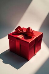 Classic red Christmas gift box; deep shadow background , red gift, packaging, box