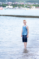 portrait of a teenager on the seashore or ocean