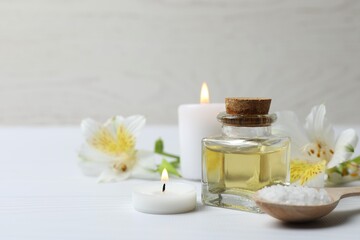 Herbal therapy, traditional medicine and homeopathy concept. Bath salt, candles and bottle natural organic oil essence serum. Set for spa, massage and aromatherapy 