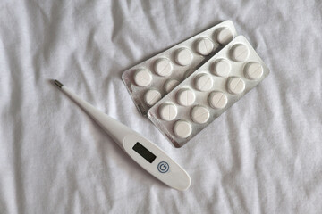 thermometer and pills