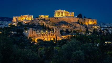 Acropolis Parthenon historical site illuminated at night in Athens, Greece