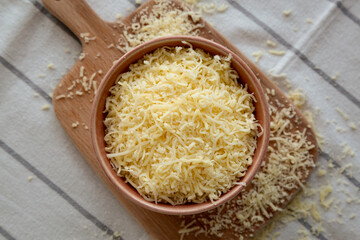Organic Grated Cheese Mix in a Bowl, top view.