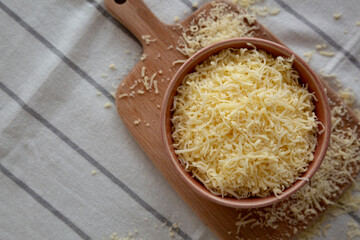 Organic Grated Cheese Mix in a Bowl, top view.