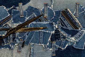 Crafting denim art with fabric scraps and scissors in a creative workspace during daylight