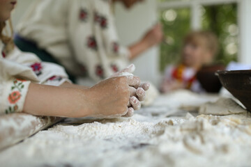 Shaping dough for traditional dish in home kitchen