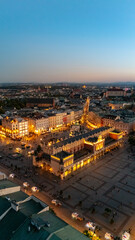 aerial view over central square of krakow in evening at sunset in poland