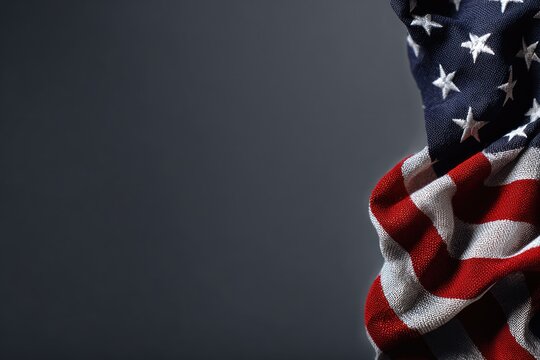 American flag draped on dark gray background