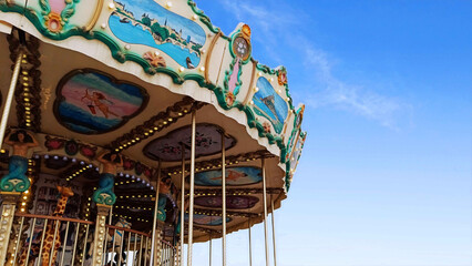 Merry-go-round with blue sky in the background
