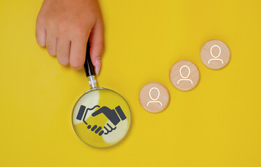 Cubes with handshake symbol. Business agreement between different parties. Business deal,...
