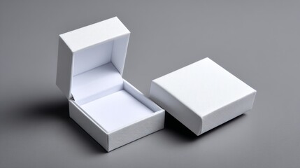 Open white gift box with lid beside on gray surface for packaging branding mockup minimalist concept