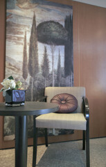 View into oceanview panoramic window porthole cabin stateroom in cozy Italian interior design...