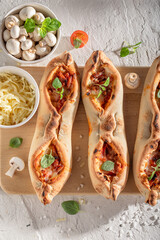 Delicious fruste Margherita made of cheese and tomatoes.