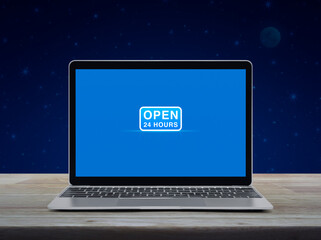 Open 24 hours flat icon on modern laptop computer screen on wooden table over fantasy night sky and moon, Business full time online service concept