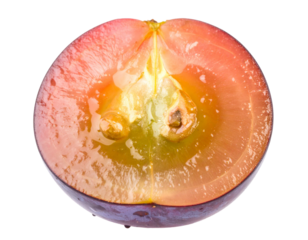 A beautiful red grape cut in half, isolated on a white background, ready for use as a fresh ingredient graphic.