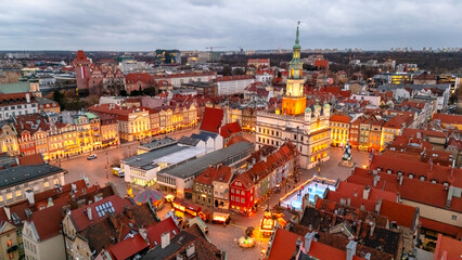 evening view of central square of poznan in winter at sunset