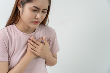 hand hold chest with heart attack symptoms, woman have chest pain caused by heart disease, leak,...