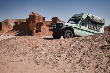 Offroad camper Puch 230GE climbing in Colinas Canyon, Angola © Moritz