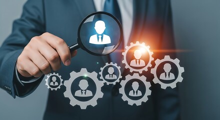 Businessman examining employee icons with magnifying glass representing human resources and talent management concept