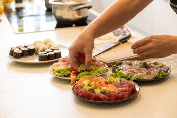 Homemade Sushi and sashimi Close-Up with Fresh Ingredients in a Modern Kitchen Setting