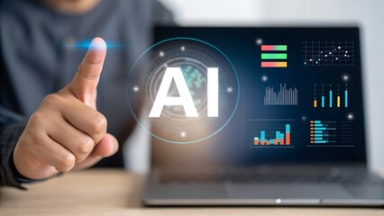 Person interacting with ai technology and data visualizations on a laptop screen