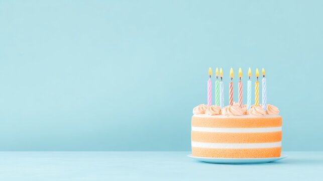 A pastel orange and white layered birthday cake with eight lit colorful candles on a blue background - Powered by Adobe
