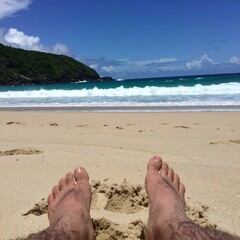Barefoot on sandy beach