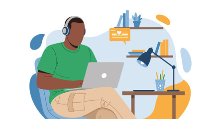 A focused individual with headphones works on a laptop, enjoying remote productivity from a modern and comfortable home office setup, surrounded by stylish decor.