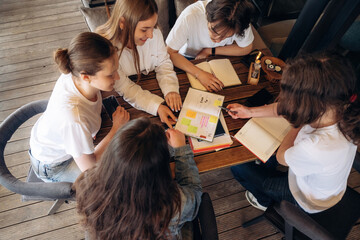 Top down view. Group of young friends are in the cafe restaurant © standret