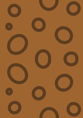 ブラウンの背景にこげ茶色の不規則な楕円の水玉模様　amber background with irregular oval water droplets pattern